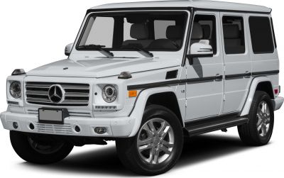 Front-side view of a white SUV with V8 badge and boxy design