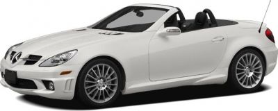 White convertible sports car with sleek design and alloy wheels