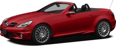 Red convertible with sporty alloy wheels and open roof