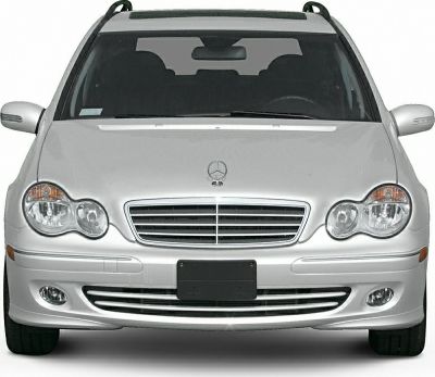 Front view with distinctive headlights, grille, and fog lights of a wagon