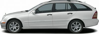 Side profile of a silver facelift Mercedes T-modell wagon with roof rails