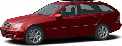 Red station wagon with roof rails and multi-spoke alloy wheels