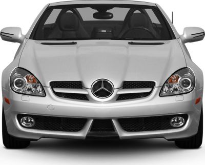 Front view with headlights and grille of a silver sporty coupe