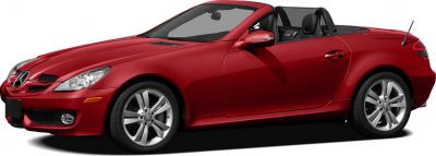 Red convertible roadster with sporty alloy wheels and sleek aerodynamic design