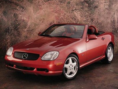 Red convertible roadster with sleek aerodynamic design and alloy wheels