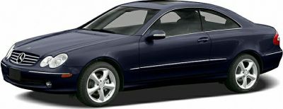 Sleek side profile of a luxury coupe with distinctive alloy wheels.