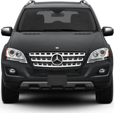Front view with prominent grille and headlights