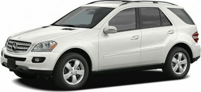Silver SUV side view with alloy wheels and tinted windows