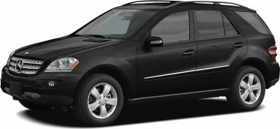 Black SUV front-side view with alloy wheels