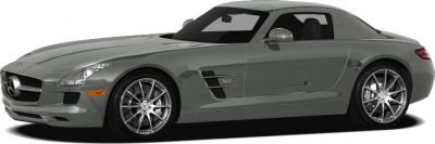 Side profile of a sleek sports coupe with aerodynamic design and alloy wheels.