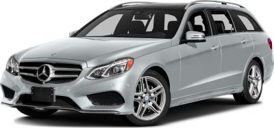 Silver wagon with alloy wheels, roof rails, and sleek headlight design