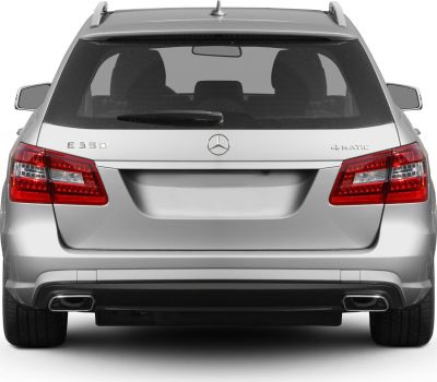 Rear view with tail lights, roof rails, badges, and dual exhausts
