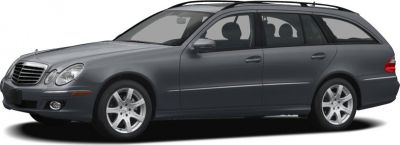 Gray station wagon with alloy wheels and roof rails, side profile view