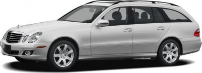 Silver mid-size luxury station wagon with elegant design and roof rails