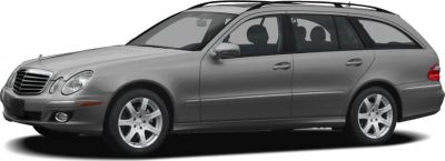 Side view of a grey elongated station wagon with alloy wheels