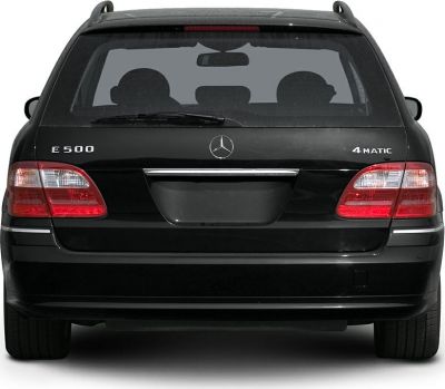 Rear view of estate car with taillights, emblem, and 4MATIC badge