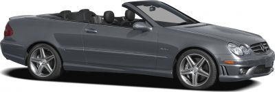 Convertible luxury coupe with distinctive five-spoke alloy wheels and front-side view.