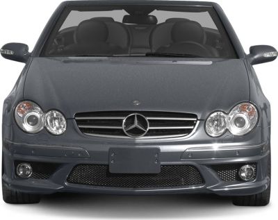 Front view with dual round headlights and mesh grille