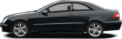 Side profile of a sleek two-door coupe with alloy wheels and tinted windows.
