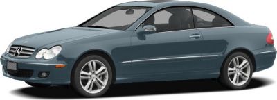 Sleek coupe with dual round headlights and five-spoke alloy wheels