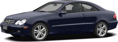 Sleek coupe with streamlined body and distinctive twin-headlight front