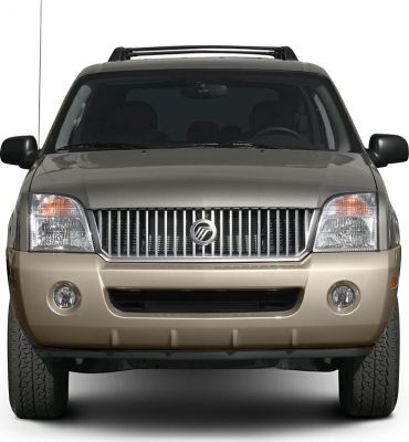 Front view focusing on grille, headlights, and fog lights of an SUV.