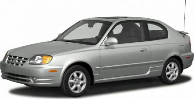 Silver compact sedan with alloy wheels and sunroof