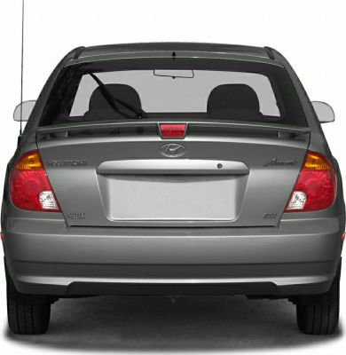 Rear view of hatchback with roof spoiler and rear wiper