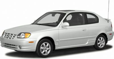 Front 3-quarter view of a small hatchback with visible headlights and wheels