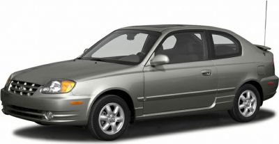 Front 3-quarter exterior view of compact hatchback with alloy wheels
