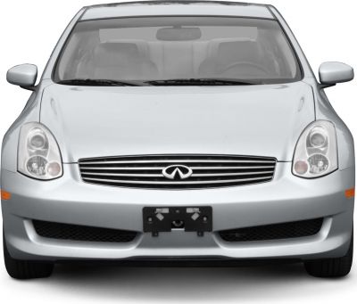 Front grille and headlights of a silver coupe