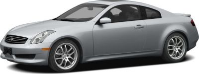 Silver two-door sports coupe with aerodynamic body and alloy wheels