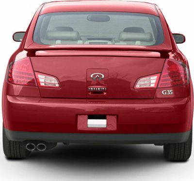 Rear view of sedan with dual exhaust and tail lights
