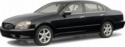 Black sedan with sleek profile and alloy wheels.