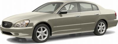 Front side view of a luxury four-door sedan with alloy wheels