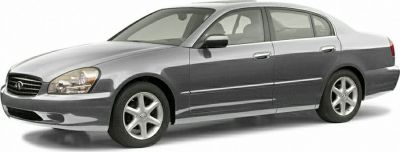 Sleek sedan with smooth body, distinctive headlights, and alloy wheels.