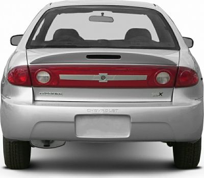 Rear view of a silver compact sedan with distinctive taillights and LX badge