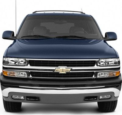 SUV front view with dual headlights and wide grille
