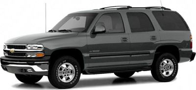 Full-size SUV front side view with chrome grille and alloy wheels