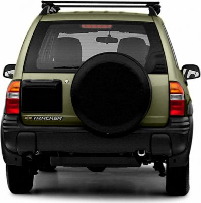 Rear view with spare tire on the back door and roof rack