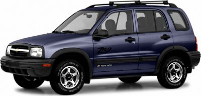Side profile of blue SUV with ZR2 badge and roof rails
