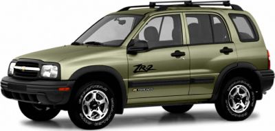 Side view of rugged SUV with ZR-2 logo and roof rack