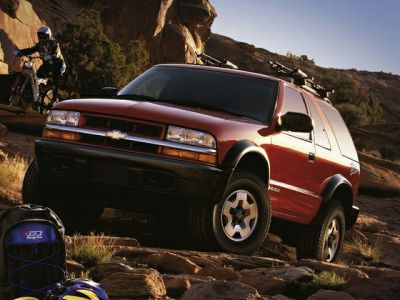 2-door SUV navigating rocky off-road terrain
