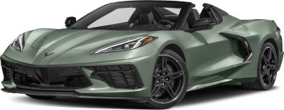 Front angle of a sleek convertible with sharp headlights and black alloy wheels