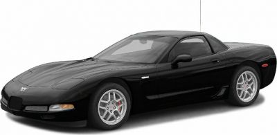 Black sleek sports coupe with aerodynamic design and alloy wheels