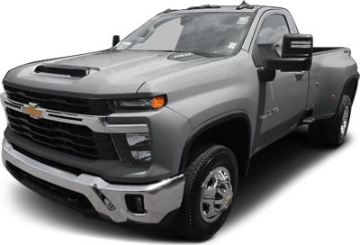 Front view of pickup with hood scoop and dual rear wheels