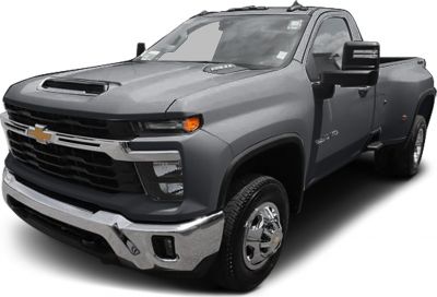 Front-side view of heavy duty pickup with crew cab and standard bed.