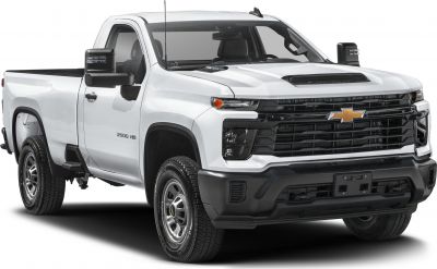 Double cab pickup with bold front grille and towing mirrors