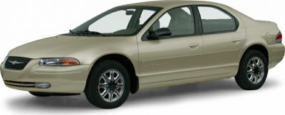 Beige four-door sedan front side view with alloy wheels