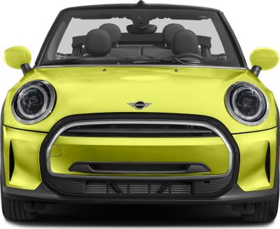 Front view with round headlights and distinctive grille